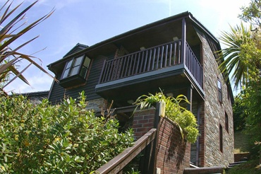 Exterior of one of our 2 bed cottages showing balcony