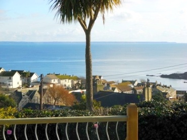 Sea view over Mousehole and Mounts Bay