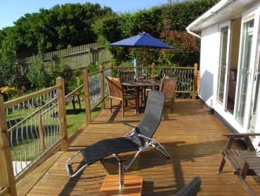 Sandpiper has a large deck for sunbathing and dining