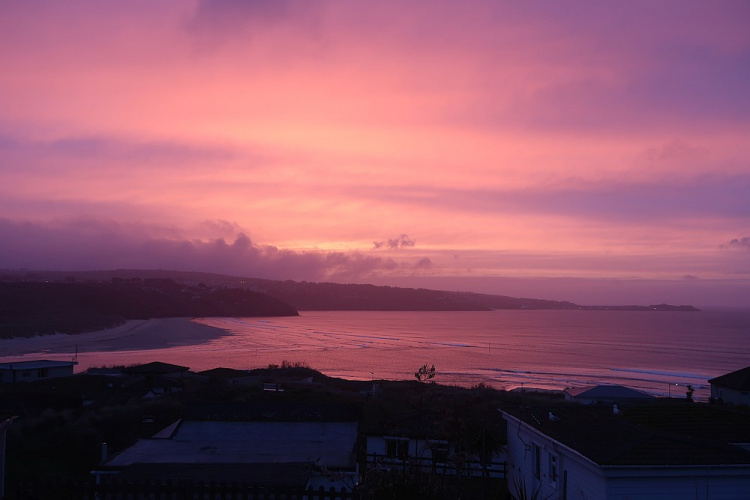 View of sunset from the balcony at Treford